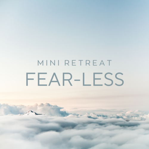 A tranquil mountain peak emerging from soft clouds under a pastel blue sky, with the text "Mini Retreat: Fear-Less" overlaid.